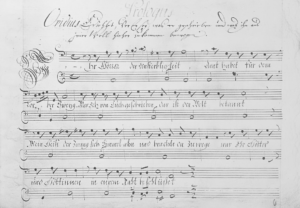 Handwritten musical score with lyrics — Foto por Europeana na Unsplash